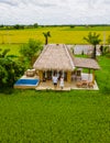 Eco farm homestay with a rice field in central Thailand, couple vacation at a farm, men and women