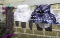 Eco-friendly baby cloth diapers hanging outside to dry