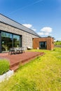 Eco-friendly backyard with wooden terrace