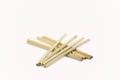 Eco-friendly bamboo drinking straws straws against white background, \'no to plastic\' concept