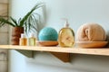 eco-friendly bath products and loofah on a shelf