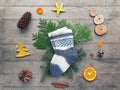 Eco Friendly Christmas flat lay. Winter holiday in Hygge style. Knitted childs socks, fir branches, handmade toy snowman and craft Royalty Free Stock Photo