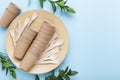 Eco friendly concept. Bamboo dish and cutlery, paper cups isolated on