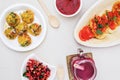 Eco-friendly Cutlery Demo consisting of Sev Puri, Salad, Tomato Garlic Bread, Beetroot Juice and Schezwan Sauce. Concept. Royalty Free Stock Photo