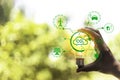 eco friendly energy. Innovation technology eco green concept. Icon bulb energy sources for renewable on green blur background.