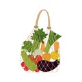 Eco friendly fabric bag with vegetables and greens.