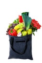 Eco-friendly gray reusable shopping bag filled with different fruits, vegetables and goods Royalty Free Stock Photo