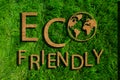 Eco-friendly inscription on the green grass