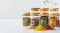 eco friendly kitchen storage on white background,various spices in glass jar, bamboo. Generative Ai Royalty Free Stock Photo