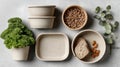 Eco-friendly kitchenware set with seeds, bread, almonds, kale, and eucalyptus on Royalty Free Stock Photo