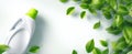 The eco-friendly laundry detergent bottle surrounded by fresh green leaves. AI generated image Royalty Free Stock Photo