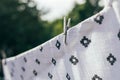 Eco- friendly laundry drying muslin diaper on clothes line Royalty Free Stock Photo