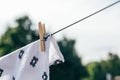 Eco- friendly laundry drying muslin diaper on clothes line Royalty Free Stock Photo