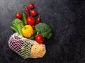 Eco friendly mesh shopping bag with fresh vegetables