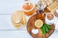 Eco-friendly natural cleaners: baking soda, soap, vinegar, salt, coffee, lemon and brush on wooden table Royalty Free Stock Photo