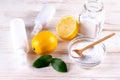 Eco friendly natural cleaners. Home cleaning concept. Baking soda sodium bicarbonate, lemon, vinergar and salt Royalty Free Stock Photo