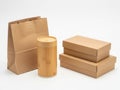Eco-friendly packaging display with paper bag, bamboo container, and cardboard boxes isolated on white background Royalty Free Stock Photo