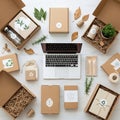 Eco-friendly packaging elements surround an open Royalty Free Stock Photo