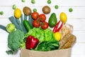 An eco-friendly paper bag with fresh food for a healthy diet Royalty Free Stock Photo