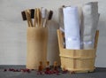 Eco-friendly personal hygiene items made of natural materials. Toothbrushes, linen towels, and bottles of rose oil Royalty Free Stock Photo