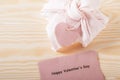 Eco-friendly pink gift with an eco-paper heart tag. Zero Wast concept. top view Royalty Free Stock Photo