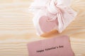 eco-friendly pink gift with an eco-paper heart tag. Zero Wast concept. top view Royalty Free Stock Photo