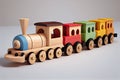 Eco friendly, plastic free toys for toddler. Stylish wooden toy train with colorful blocs for child . AI Generated