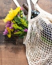 Reusable cotton macrame bag with flowers and wine