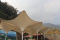 Eco friendly roof structure of sails created for shadow in mountain region of Nepal Royalty Free Stock Photo