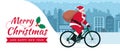 Eco-friendly Santa Claus riding a bicycle Royalty Free Stock Photo