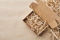 Eco-friendly shipping packaging on brown paper background, copy space Royalty Free Stock Photo