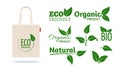 Eco friendly shopping bag. Realistic textile pack mockup for organic shop. Natural products labels and leaves icons Royalty Free Stock Photo