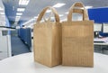 Eco-friendly shopping bags on white table Royalty Free Stock Photo