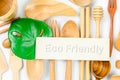 Eco friendly tag on wooden utensils Royalty Free Stock Photo