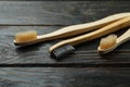 Eco friendly toothbrushes on rustic wooden background