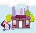 Eco friendly transport, women riding bike and house cityscape