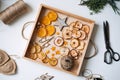 Eco friendly zero waste dried orange slices and DIY tools and stuff on the table. Handmade dried orange for Christmas Royalty Free Stock Photo