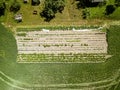 eco gardening, country garden with vegetables, onion, potatos and carrot growing. aerial view