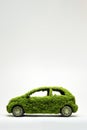 Eco Green Motoring Concept With Car Made From Green Plants And Vegetation On White Background