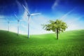 Eco green power station, wind turbines at the spring field Royalty Free Stock Photo