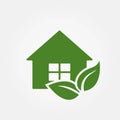 eco home icon. eco friendly building symbol. plant leaf and house. vector green color image Royalty Free Stock Photo