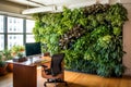 Eco home office with table, comfortable armchair and laptop. Vertical garden - wall design of green plants Royalty Free Stock Photo