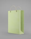 Eco packaging mockup bag kraft paper with handle half side. Standart medium green template on gray background promotional