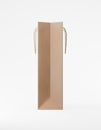 Eco packaging mockup bag kraft paper with handle side. Tall narrow brown template on white background promotional advertising. 3D