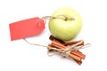 Eco shopping and perfect mix. Apples and tied cinnamon sticks Royalty Free Stock Photo