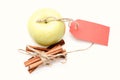 Eco shopping and perfect mix. Apples and tied cinnamon sticks Royalty Free Stock Photo