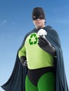 Eco superhero and CFL bulb Royalty Free Stock Photo