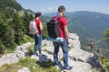 Eco tourism and healthy lifestyle concept. Young hiker girl end boy with backpack Royalty Free Stock Photo