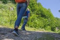 Eco tourism and healthy lifestyle concept. Young hiker girl end boy with backpack. Active hikers Royalty Free Stock Photo