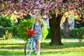 Eco transportation. Excursion to garden. Athletic woman ride retro bicycle. Travel by bike. Spring holidays. Riding Royalty Free Stock Photo